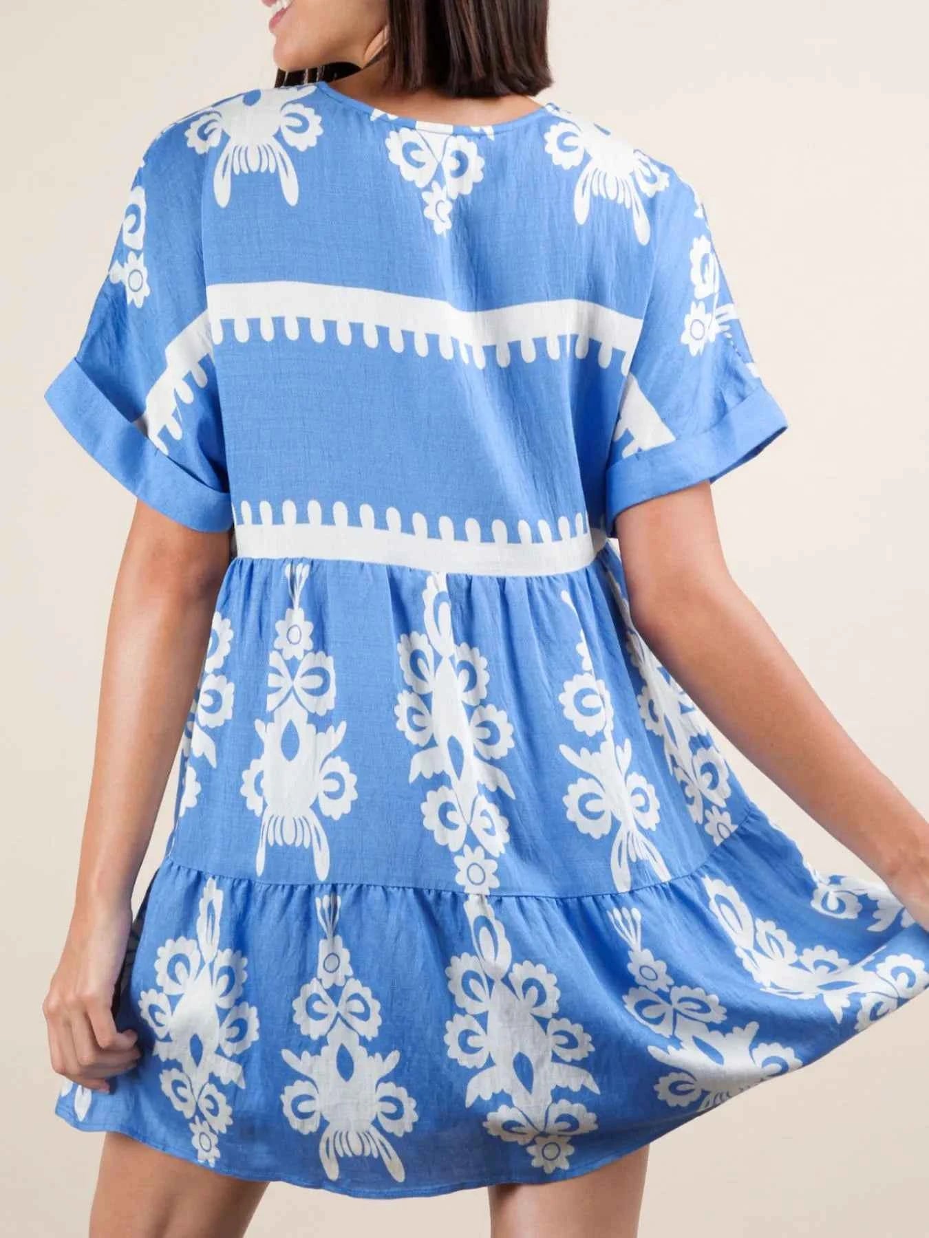 Printed V-Neck Short Sleeve Mini Dress a35f7969-e583-4782-807d-82c5128b7aed-Max-Origin