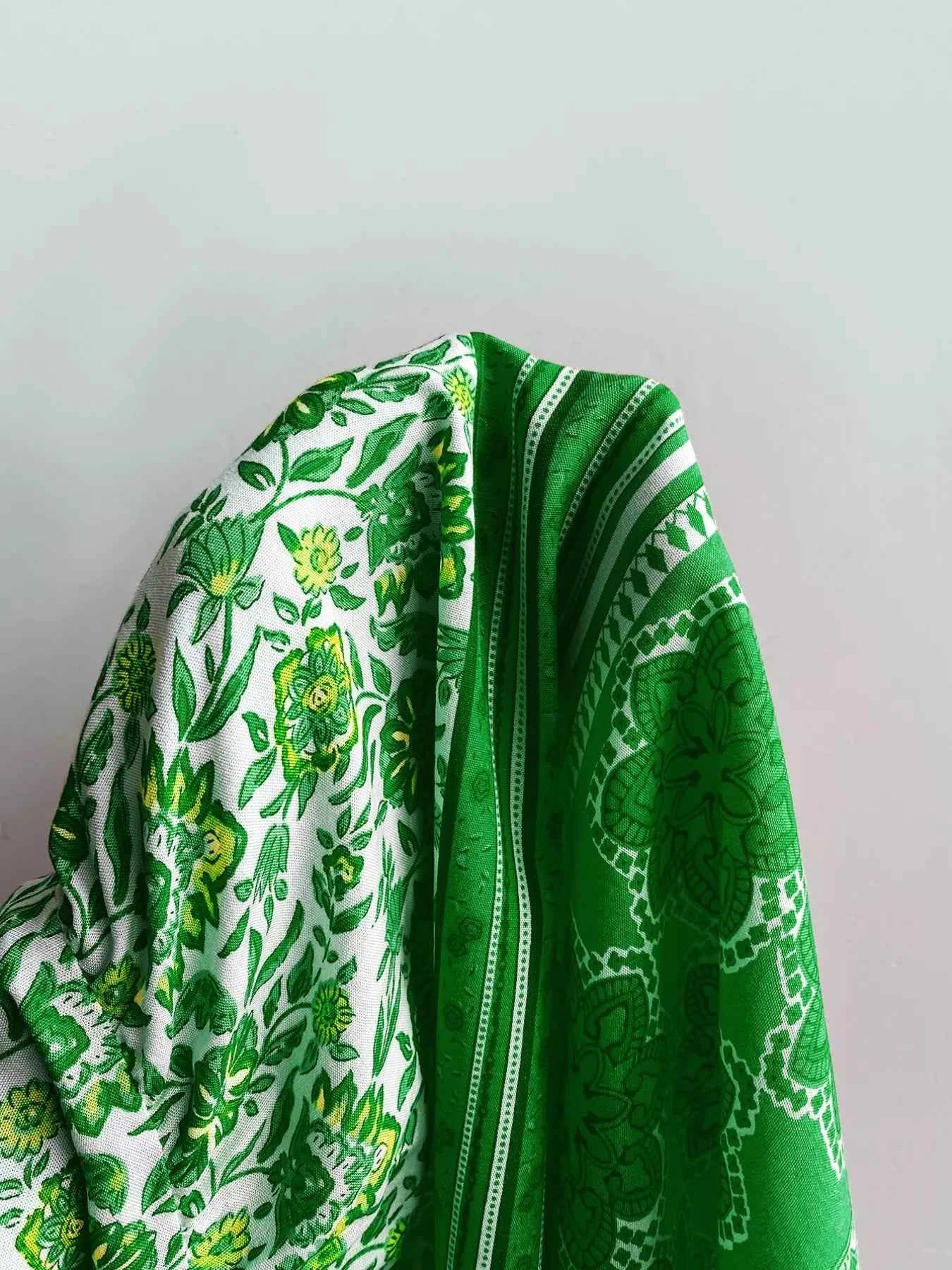 Floral Deep V-Neck Flutter Sleeves Dress a47c36d4-e8c1-4db3-b5b9-cbfad5fc0b20-Max-Origin