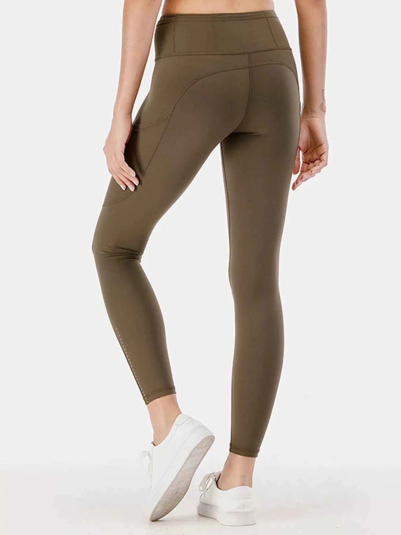 Full Size High-Waisted Active Leggings with Pockets Plus Size a5cb77c82a604a23a815d7977ccf3868-Max-Origin
