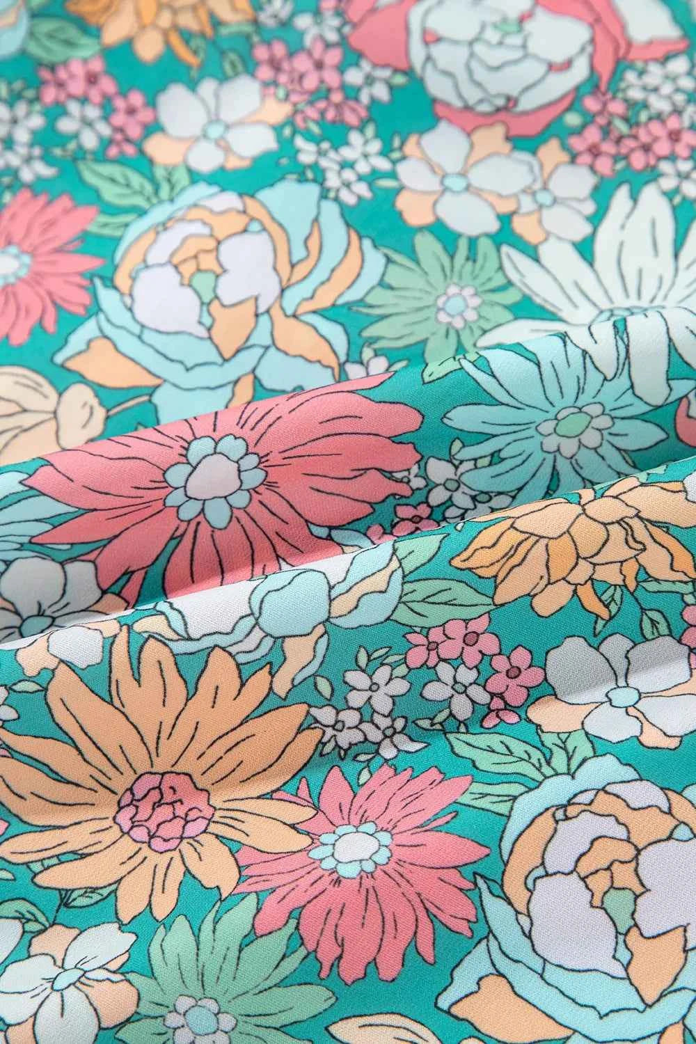 Printed Notched Short Sleeve Blouse a761c27d-172f-442a-983c-770a46d466bd-Max