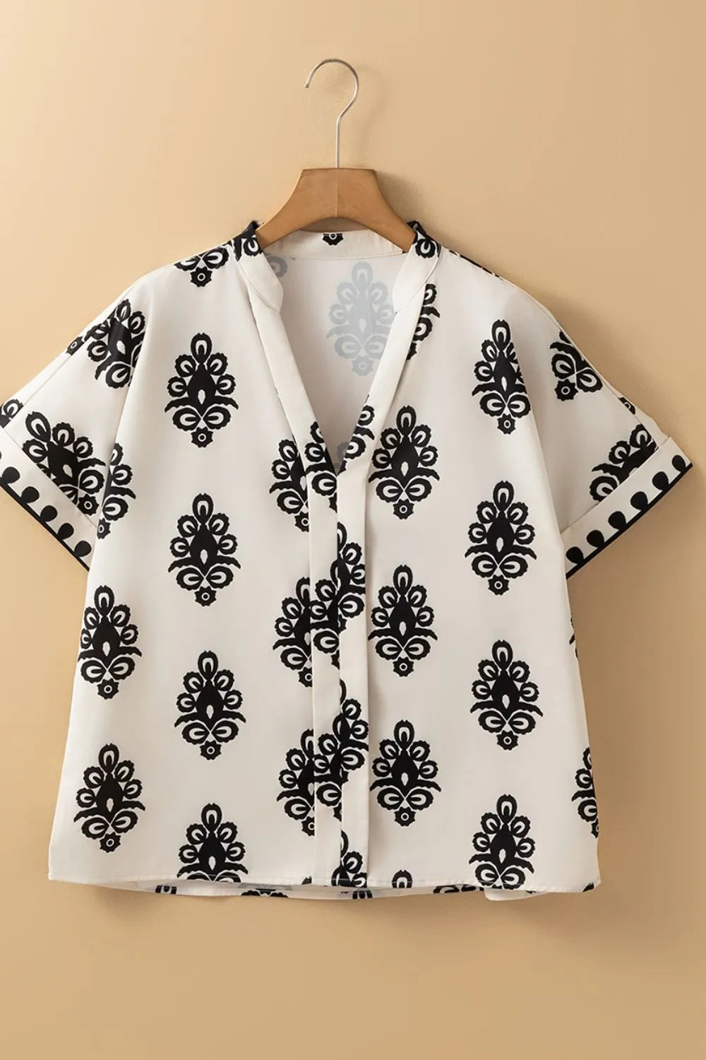 Printed Short Sleeve Loose Blouse b05ff5a8-d86d-4a1d-8d56-9364e303eb31-Max-Origin