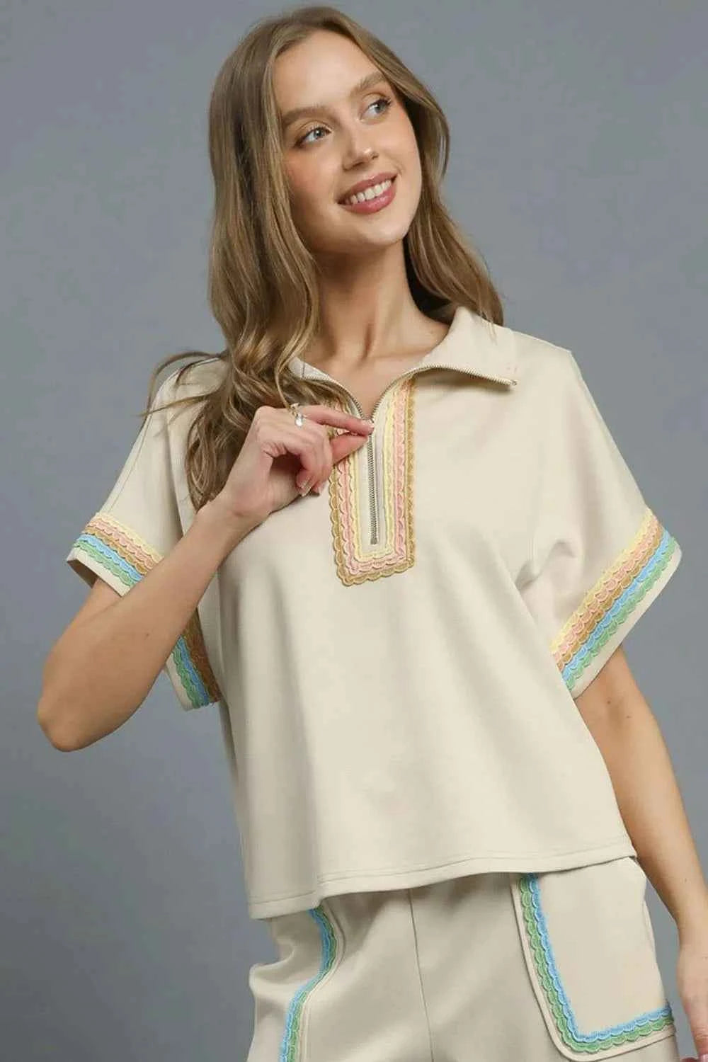 Umgee Contrast Trim Half Zip Collared Blouse Beige b0aa1c3f-fd0b-4d98-b77a-7d61d958b9f9-Max-Origin