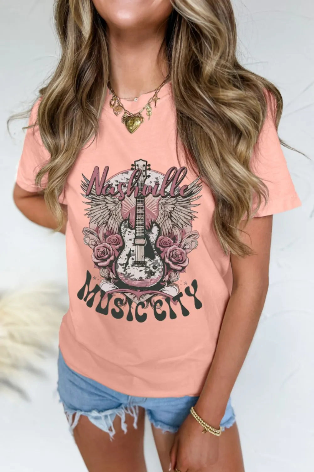 Graphic Round Neck Short Sleeve T-Shirt b0d2abd5-eaec-4c14-a129-7f2dadf4be29-Max-Origin