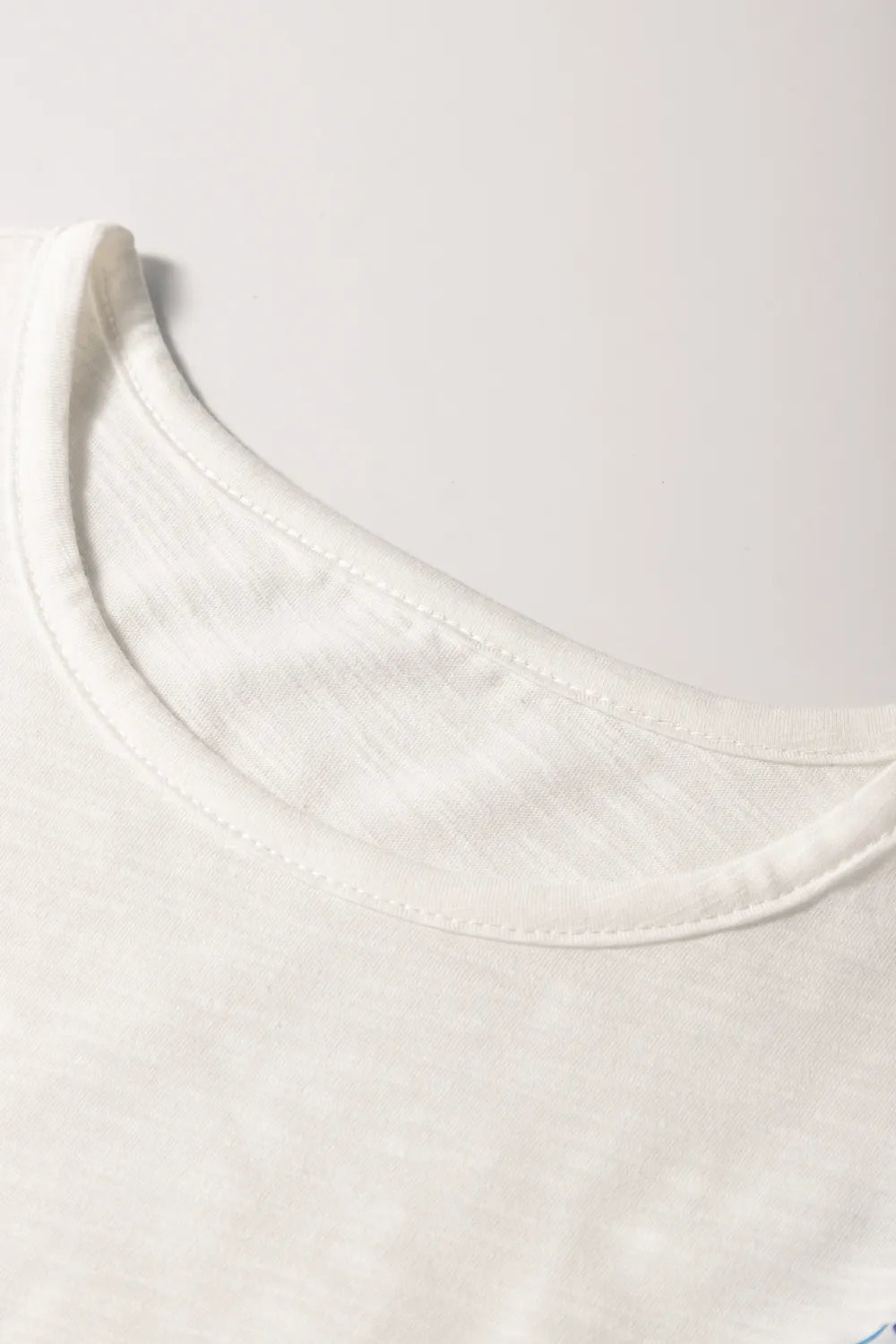 Round Neck Printed Ruffled Cap Sleeve Blouse b115f32b-aee6-4875-935c-08ff538546eb-Max