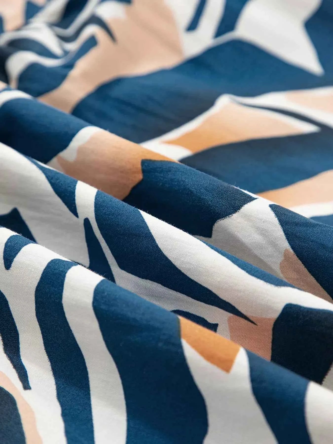 Zebra Print Tied Front Puff Sleeve Top b2ae592d857b4efe8da3b16e46e79107-Max-Origin