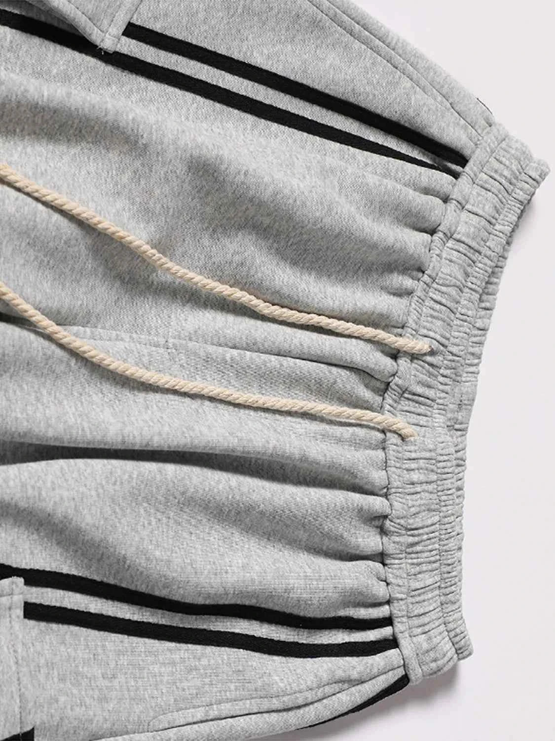 Drawstring Side Striped Wide Leg Pants b2d08b5b-ee5e-4ba5-90b3-991959704ebc-Max-Origin