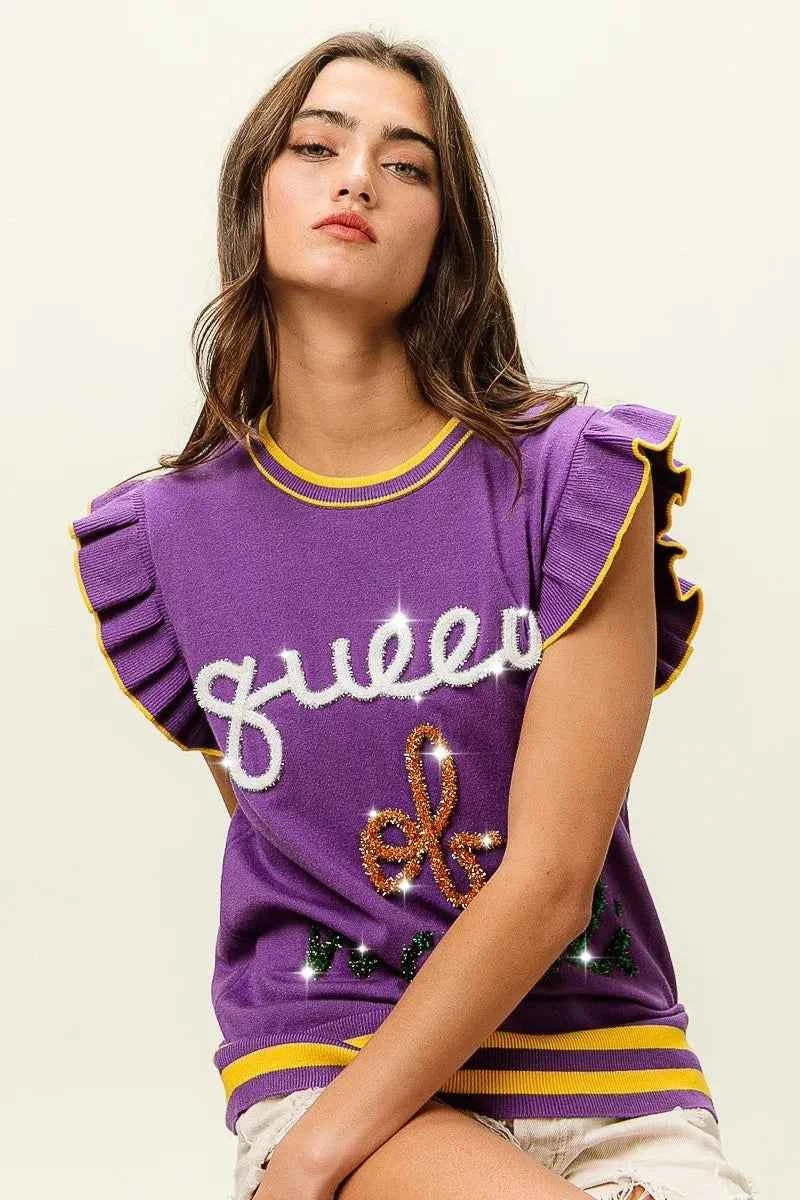 BiBi Queen Of Mardi Ruffled Armhole Sleeveless Knit Top b7529e2207164d76b0425e85eab1eb82-Max-Origin