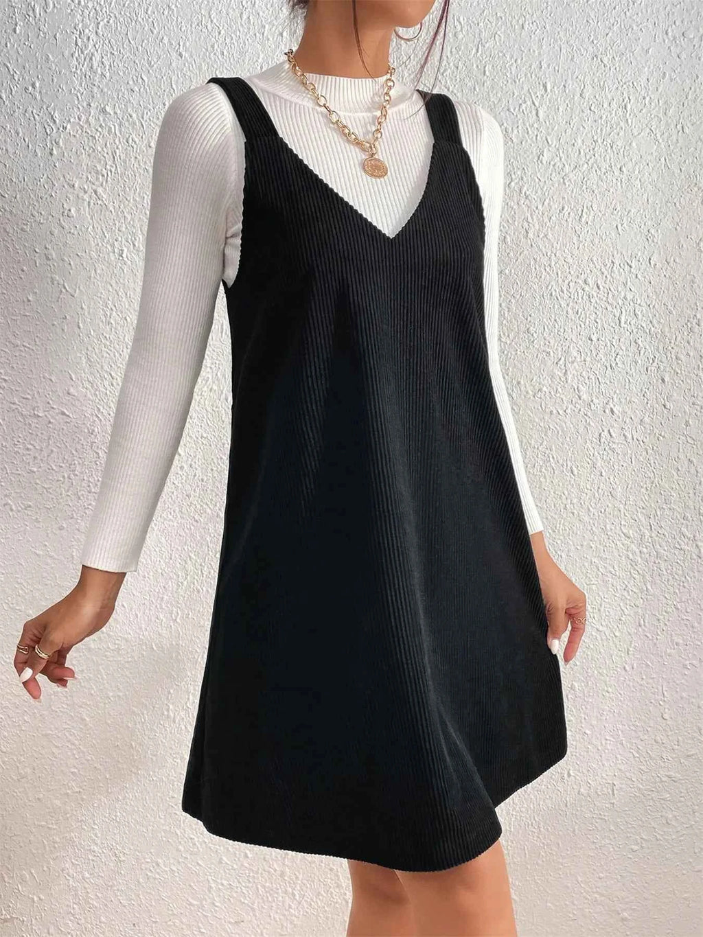 V-Neck Sleeveless Mini Dress Black bb638c088d3544acbf692cadf26f10ce-Max-Origin