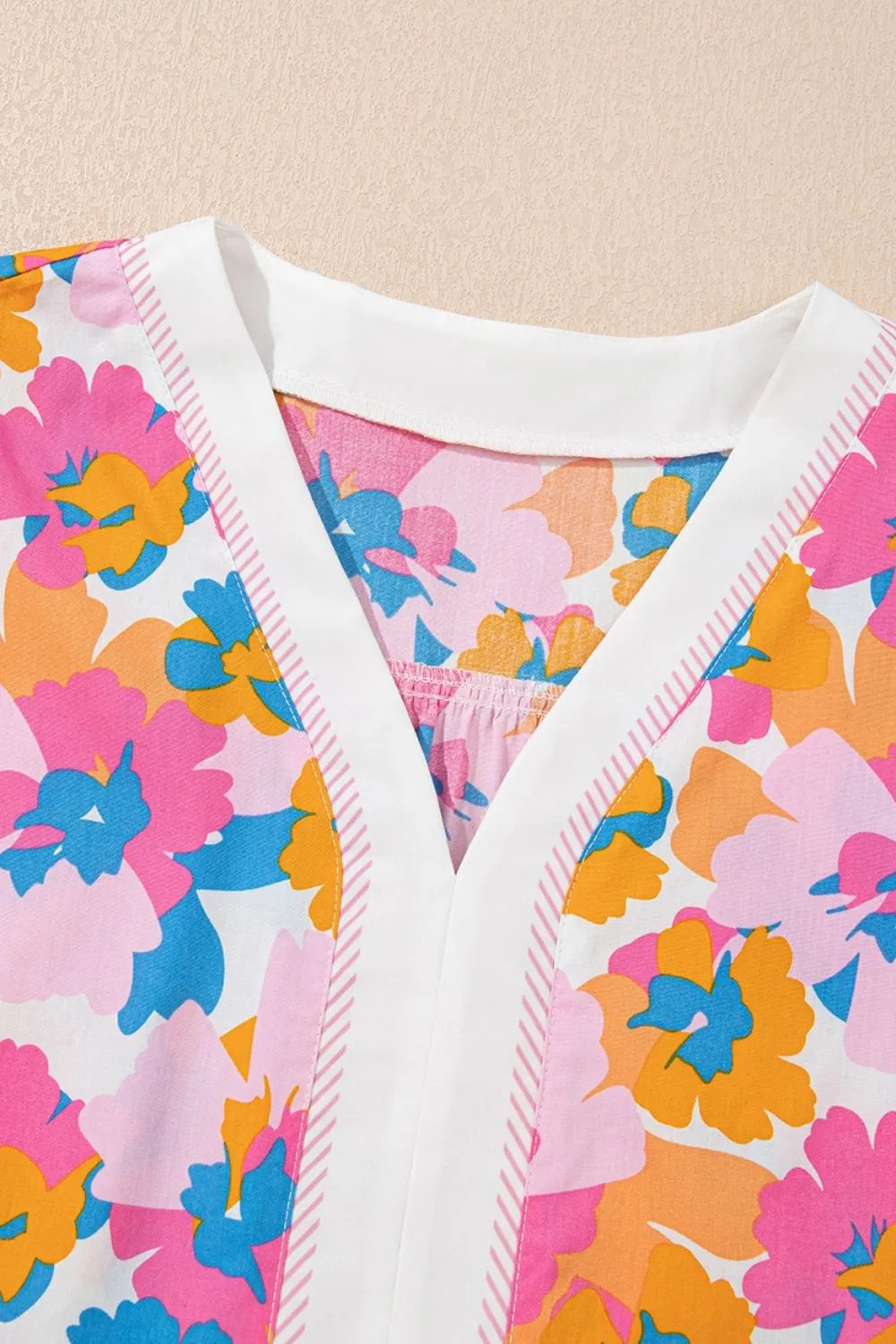 Floral Striped Edge V Neck Knotted Short Sleeve Blouse bc6b8cd9-aa19-4e2a-8b7a-c4dc910a30e2-Max-Origin