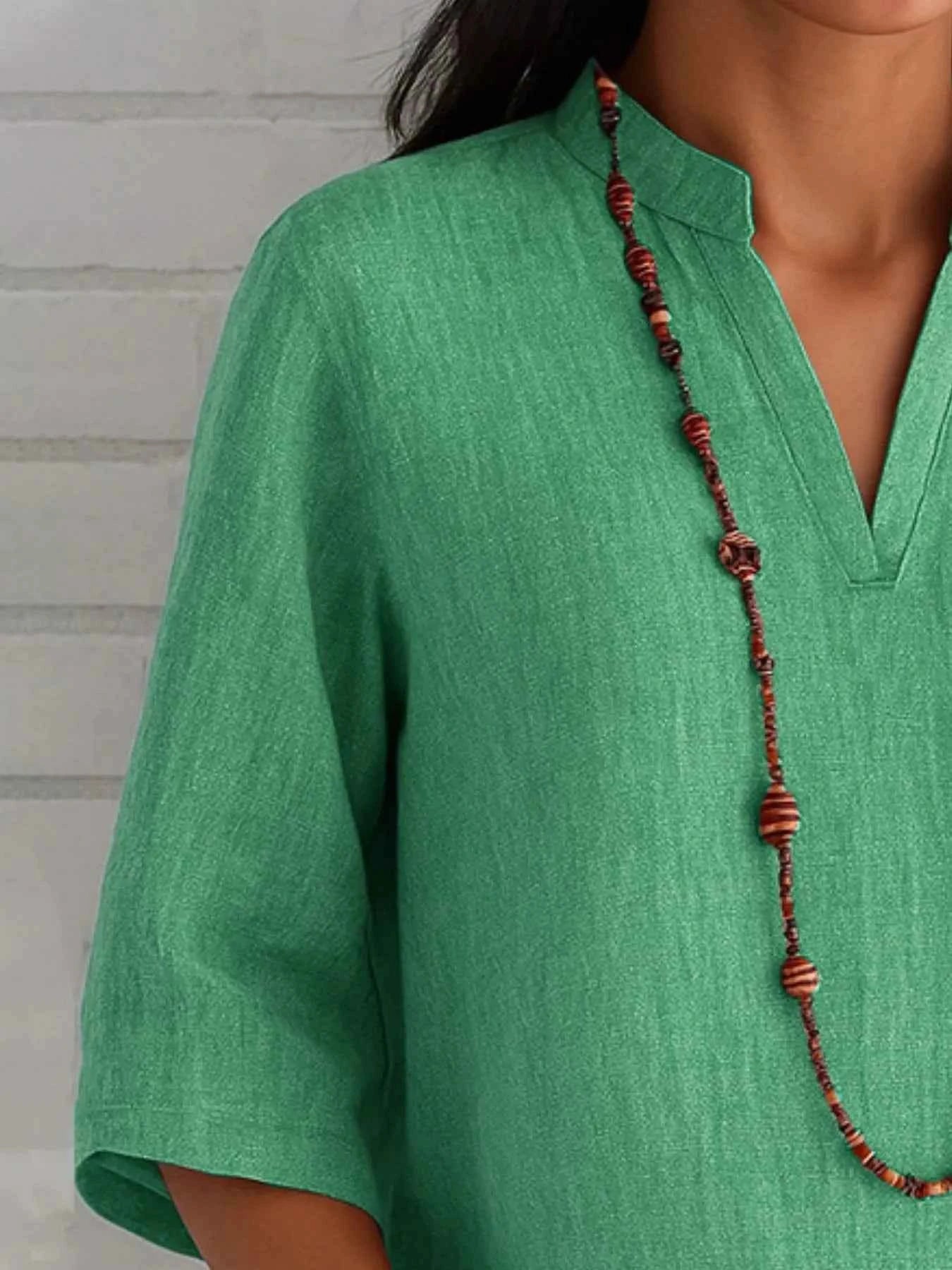 Full Size Notched Three-Quarter Sleeves Blouse Plus Size bf1fd5e9-513c-4b31-be60-9d3836d4ce30-Max-Origin