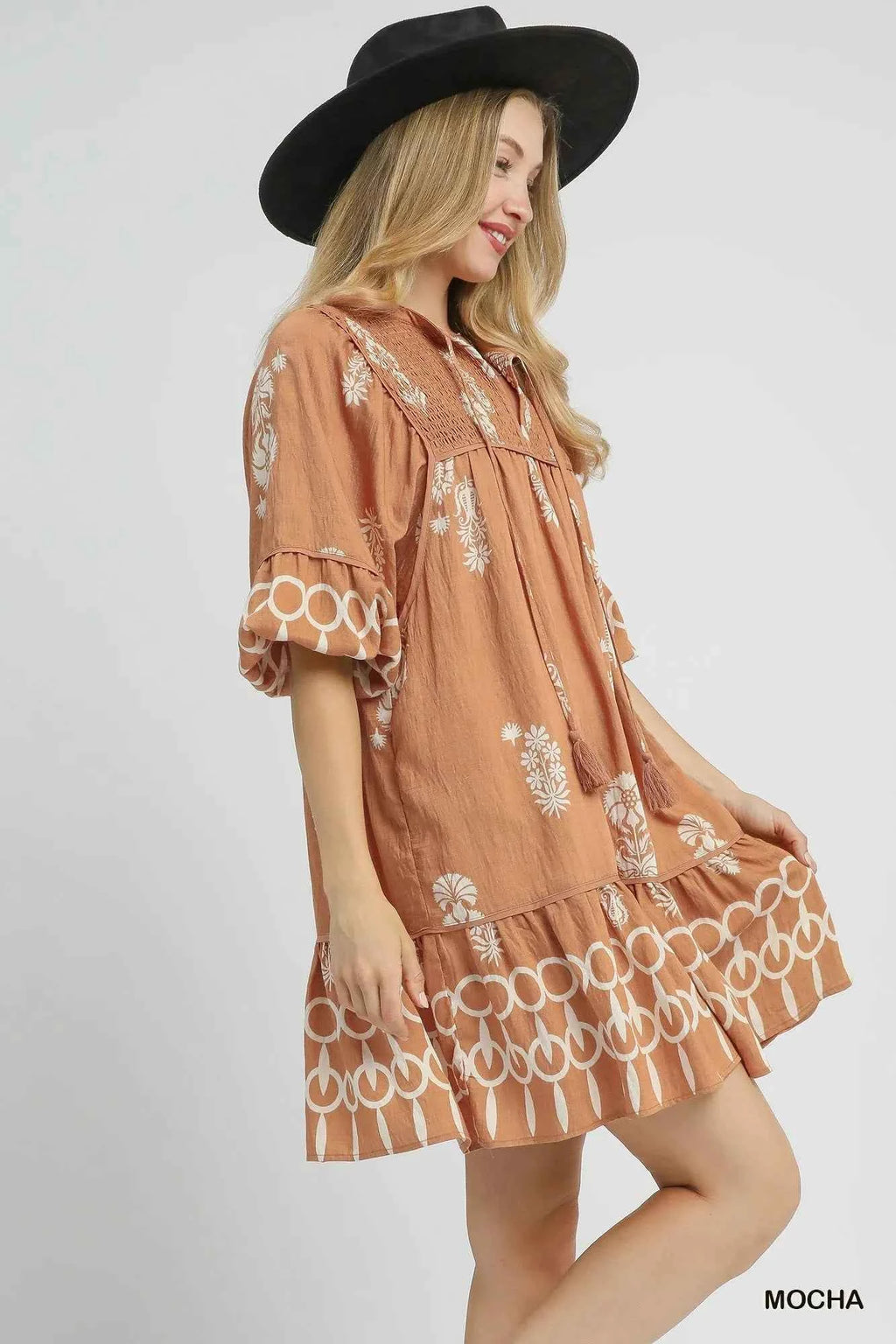 Umgee Boarder Print Tassel Tie Neck Mini Dress c1966ec4-2d65-4d2f-bca5-3c26e0394b65-Max-Origin