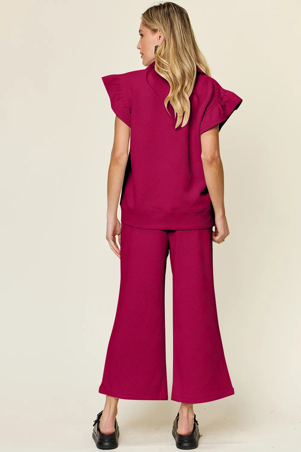 Double Take Texture Ruffle Short Sleeve Top and Drawstring Wide Leg Pants Set c3a9b893-13a3-4473-bb2c-c3bca1d641fd-Max