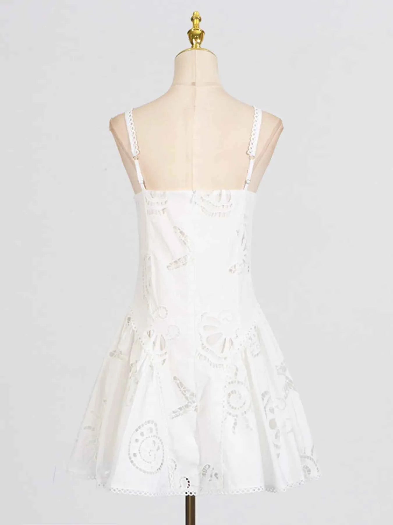 Hollow Out Adjustable Strap Mini Dress cb9dc36279bb46a4a102df6a5c081423-Max-Origin