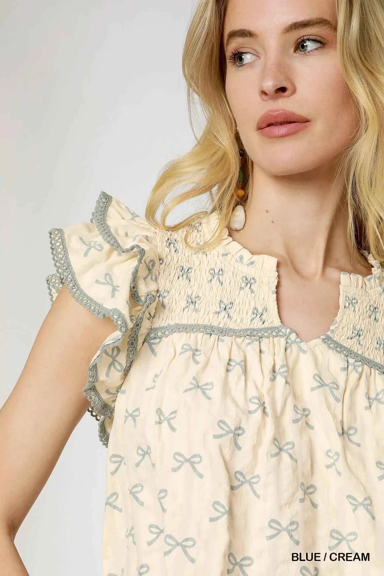 Umgee Bow Print Ruffled Cap Sleeve Mini Dress cbc6fa85-a20c-460b-afc9-416fc1067677-Max-Origin