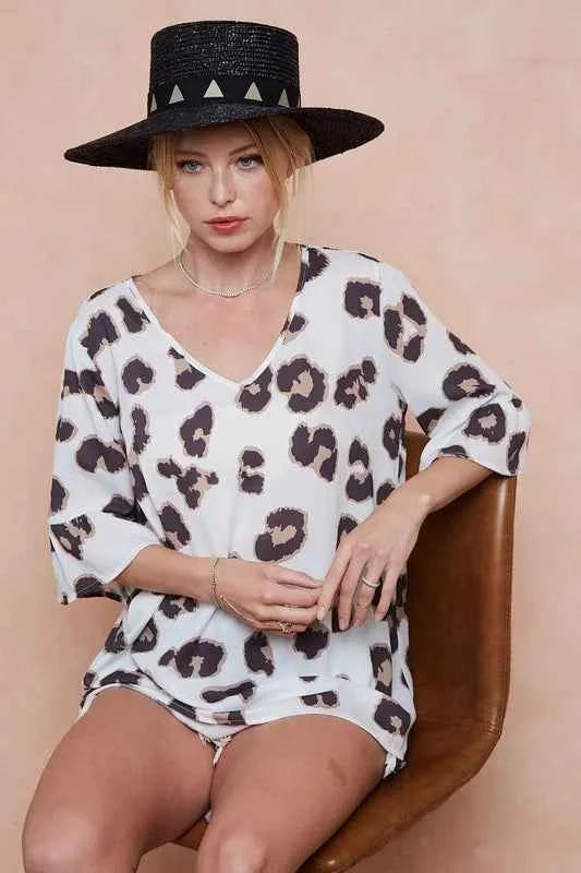 BiBi Leopard Printed V Neck Woven Top with Ruffled ce0771fd21214f2d81669af2e1887ab4-Max-Origin