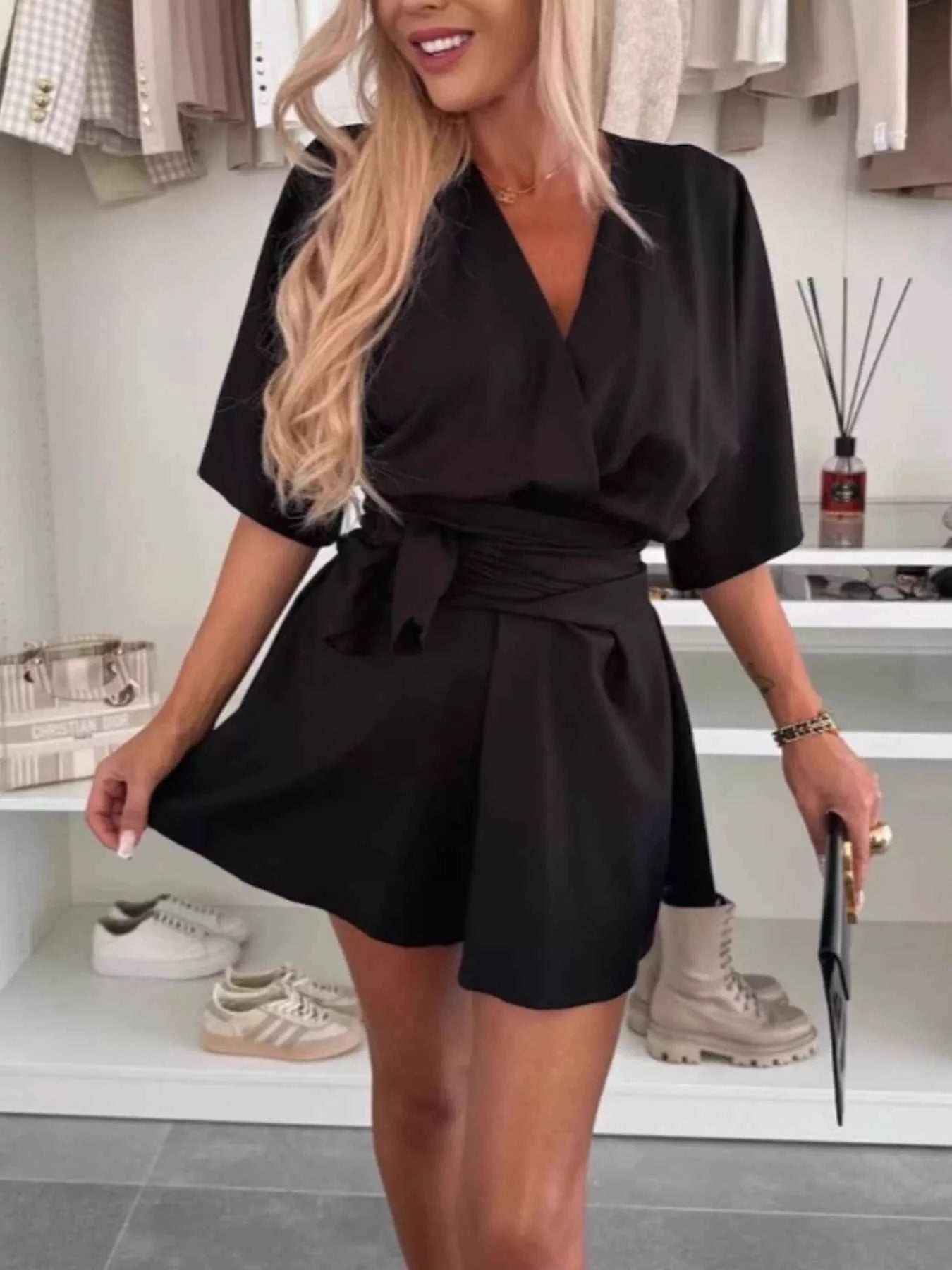 Full Size Surplice Tie Waist Romper Plus Size Black d112a13e-3ab9-4f79-8eb5-d944755224b8-Max-Origin