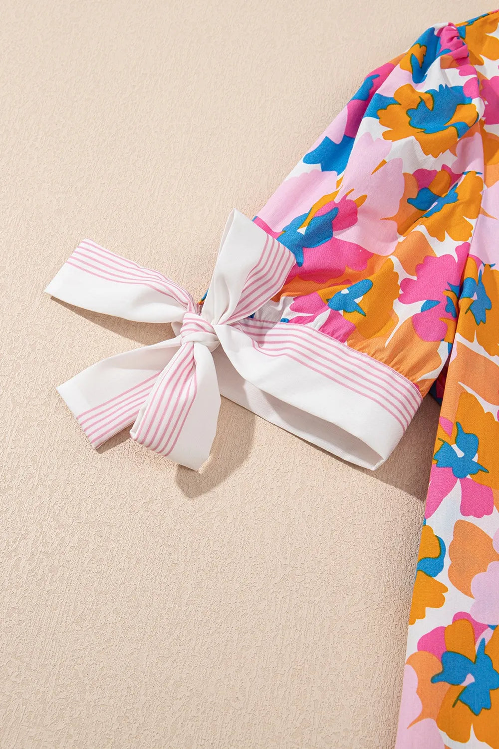 Floral Striped Edge V Neck Knotted Short Sleeve Blouse d357f70a-395f-43f4-9849-fa6e16f8b2e7-Max-Origin