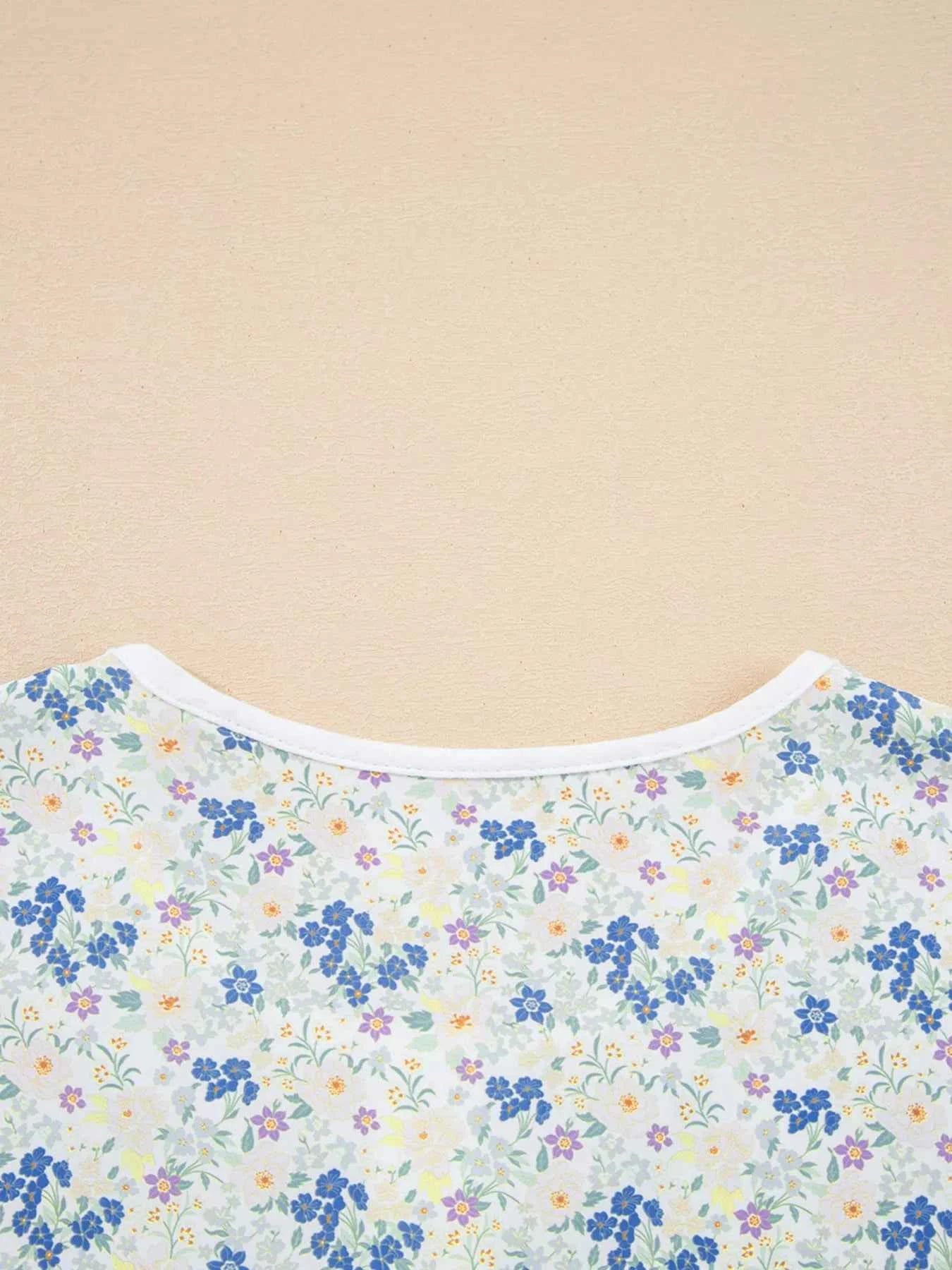 Floral Print Henley Button 3/4 Sleeve Blouse d50b68808fcc48218367f3aca7dac916-Max-Origin