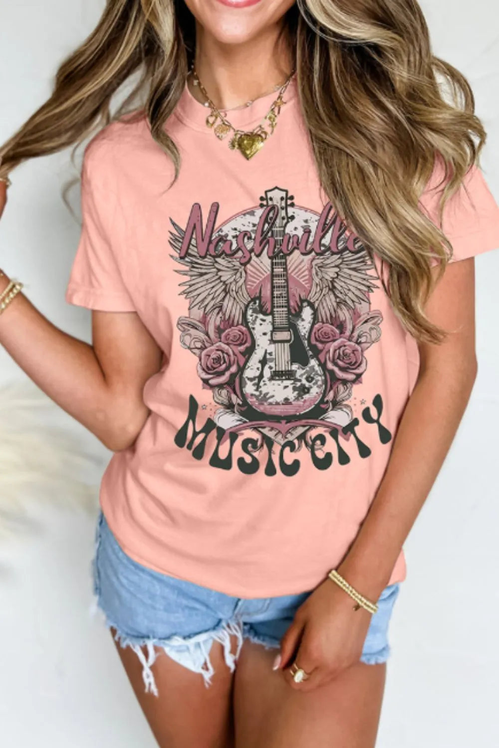 Graphic Round Neck Short Sleeve T-Shirt da455d20-d947-42e1-8f51-3de769e7d005-Max-Origin