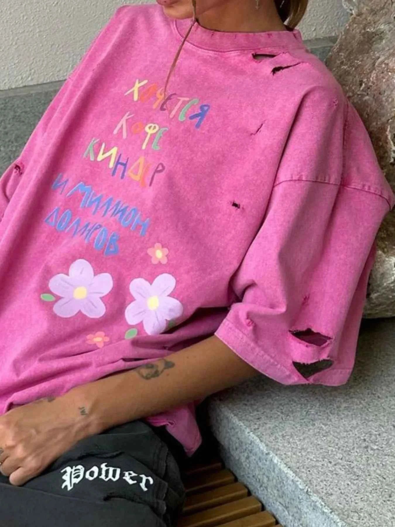 Distressed Oversized Letter Round Neck T-Shirt dc8f51a8-bd6f-4d25-ad46-ac519f77a1ff-Max-Origin