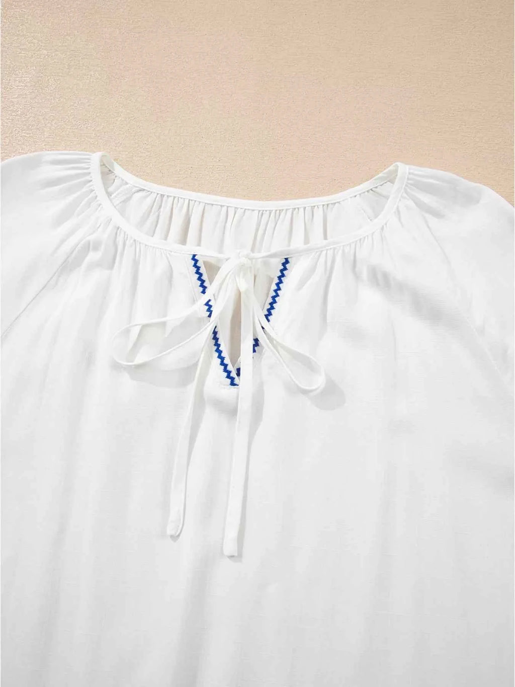 Floral Embroidered Tie Neck Blouse e414e548f4fb48babd5834f2374ed9ac-Max-Origin