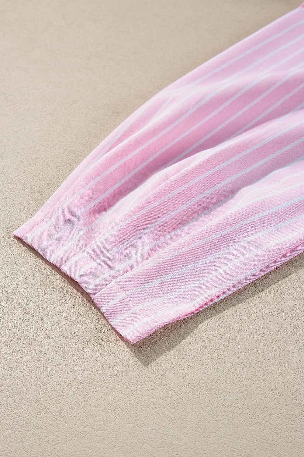 Tie Front Striped Peplum Blouse e4bba711-d97f-468b-9ef8-7cdadcca5821-Max-Origin