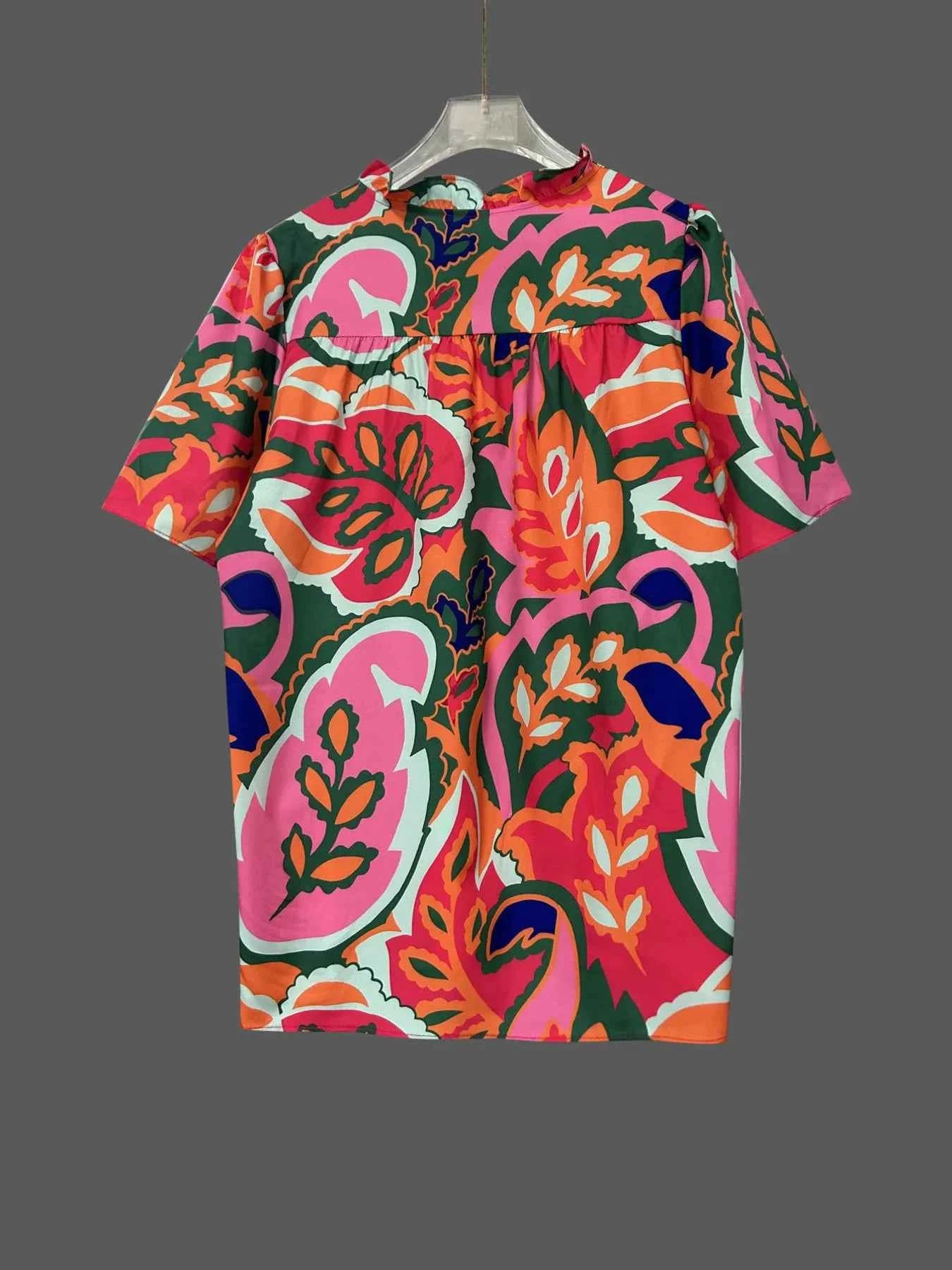 Printed Tie Neck Short Sleeve Blouse e90ee1aa2f664e17a6be2b17eb505c73-Max-Origin