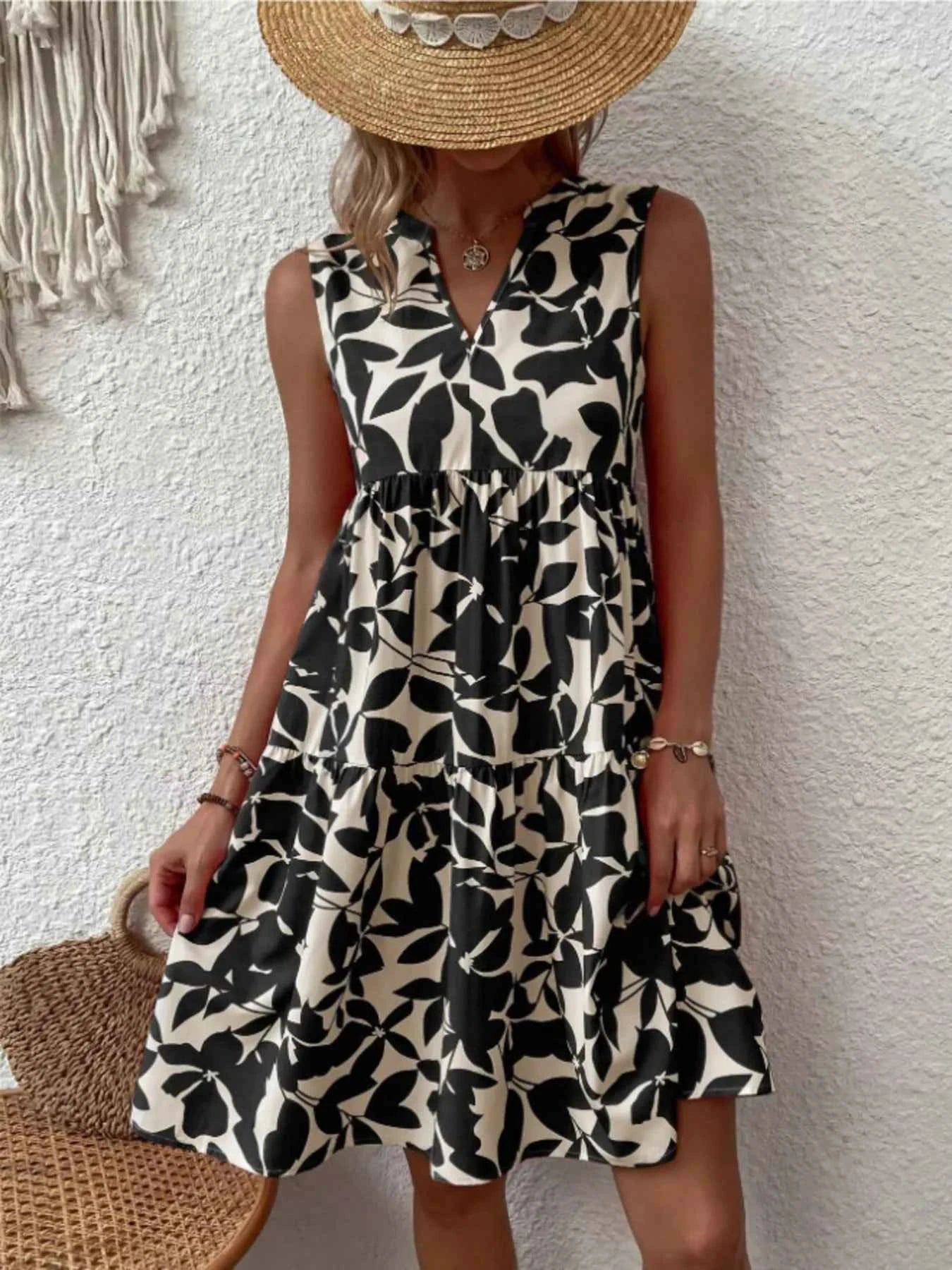 Full Size Printed Notched Sleeveless Mini Dress Plus Size Black e975d61ca07f4ef590c77f59b4dff44e-Max-Origin