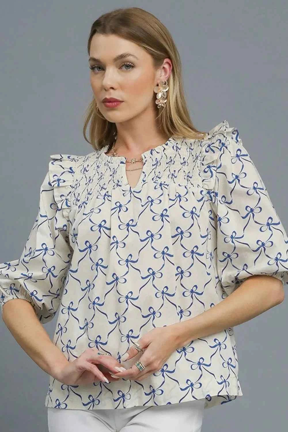 Umgee Ruffled Bow Print Notched Blouse Royal Blue ebcda201-0c24-49d3-84c7-251611c1fdb6-Max-Origin