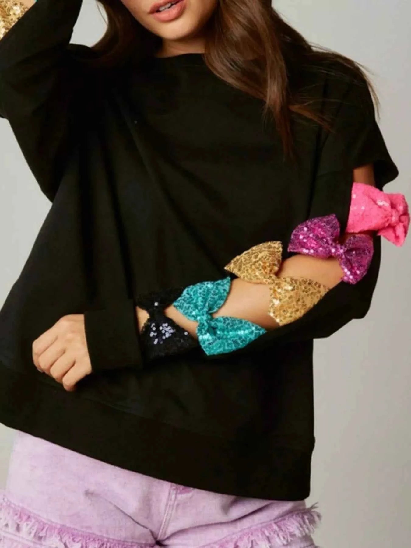 Sequin Bow Cutout Round Neck Sweatshirt f1ea7cb8-f072-4975-9156-ad699fe0e6bf-Max-Origin