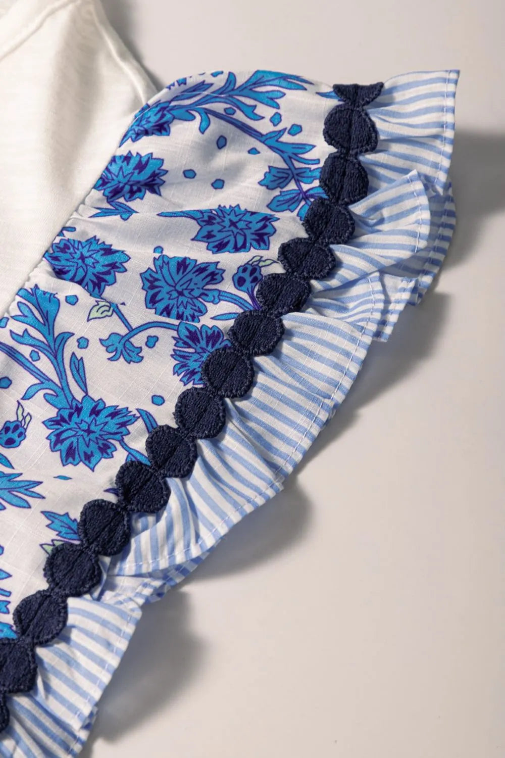 Round Neck Printed Ruffled Cap Sleeve Blouse f4740cb6-f556-4883-a9d6-23f767e07125-Max