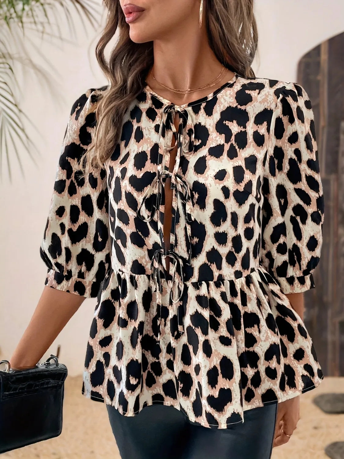 Tied Leopard Round Neck Half Sleeve Blouse fd5c3fa2-8b2a-4cd1-8273-955c915ed04c-Max-Origin